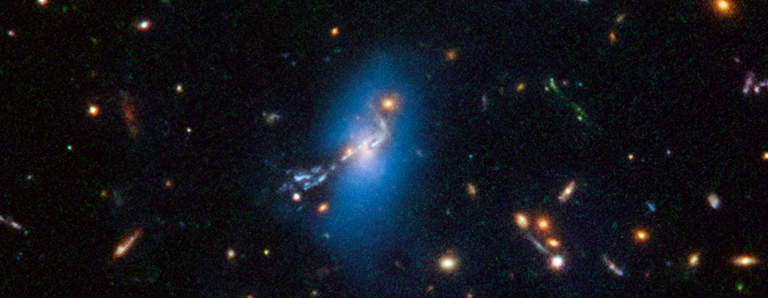 Hubble Finds That Ghost Light Among Galaxies Stretches Far Back In Time