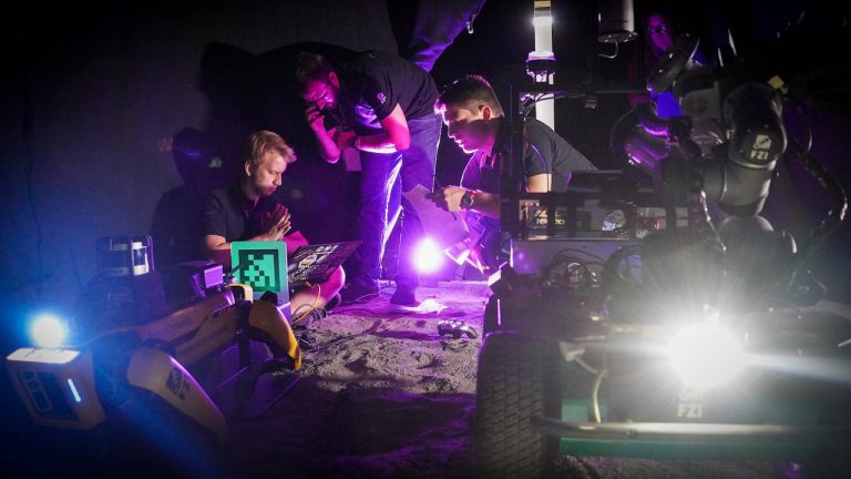 Robots, Humans, Assemble For The Moon
