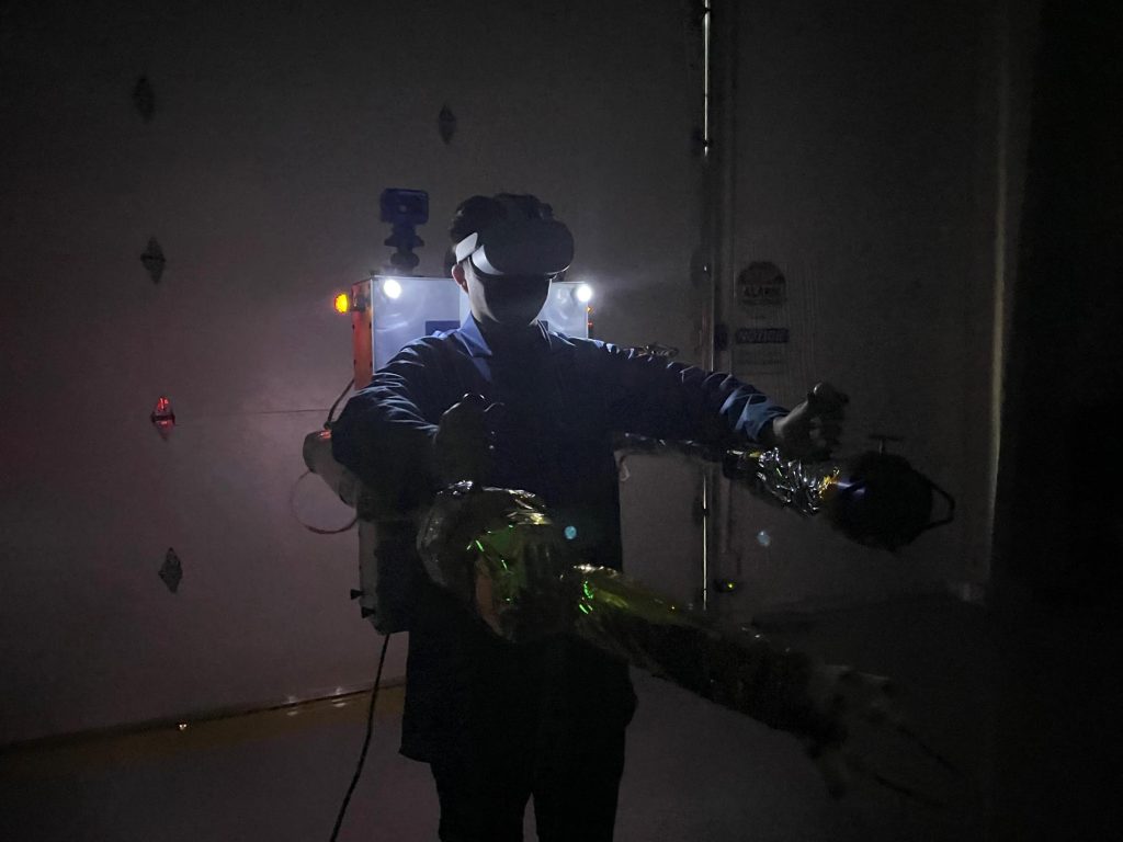 A Special Aerospace Services engineer tests the company’s Autonomous Maneuvering Unit.